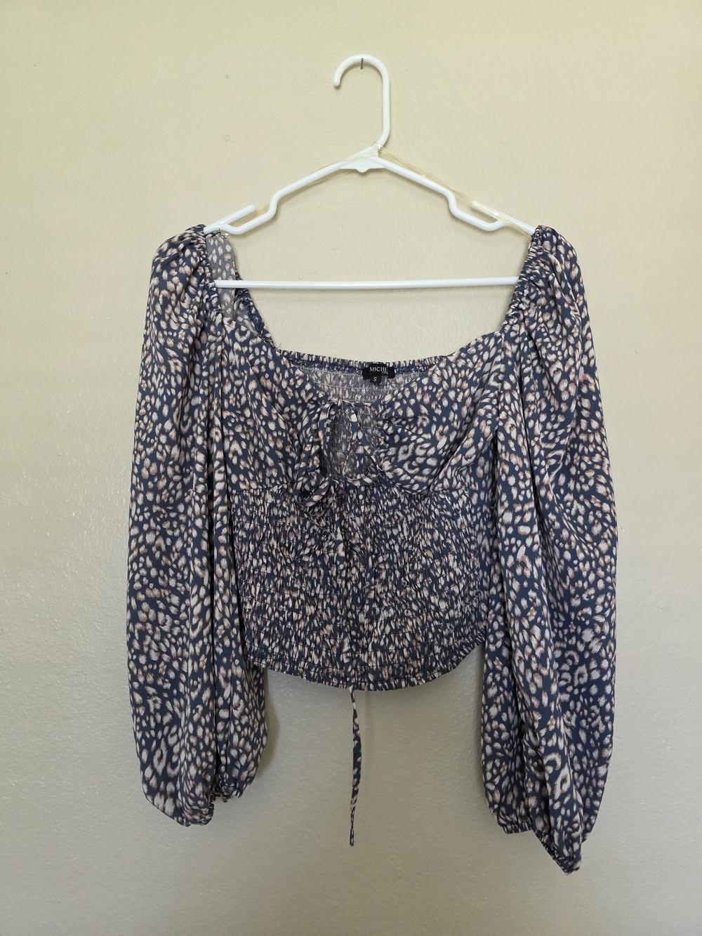 Smocked Off-Shoulder Blouse in Navy and Cream Animal Print